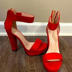 Show land 6.5 red heels